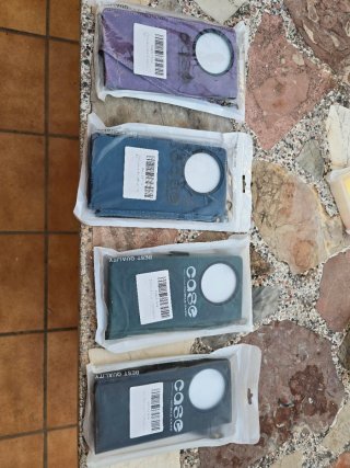 Fundas movil tipo libro con asa y billetero.