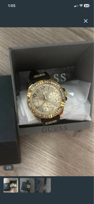 Reloj Guess Dorado y Negro ( NEGOCIABLE )