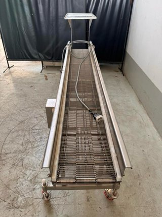 Transportadora de arrastre tubular