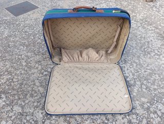 Maleta Delsey azul y marrón