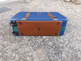 Maleta Delsey azul y marrón