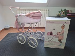 Carrito de muñecas rosa