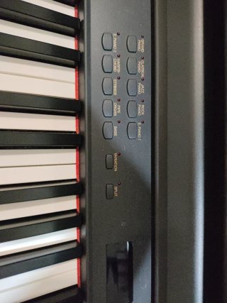 Piano Digital Yamaha Clavinova CLP-860 y banqueta.
