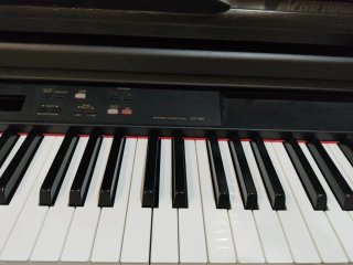 Piano Digital Yamaha Clavinova CLP-860 y banqueta.