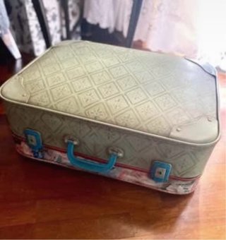 Valigia vintage decorata a mano
