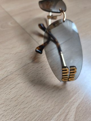 Gafas de sol Miu Miu SMUA51 Mujer