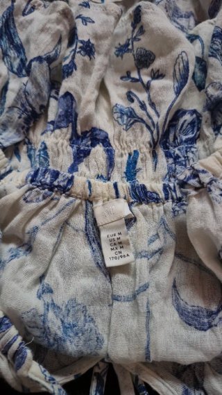 Top estampado flores azules H&M