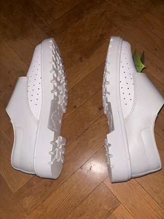 Zapato blanco de trabajo