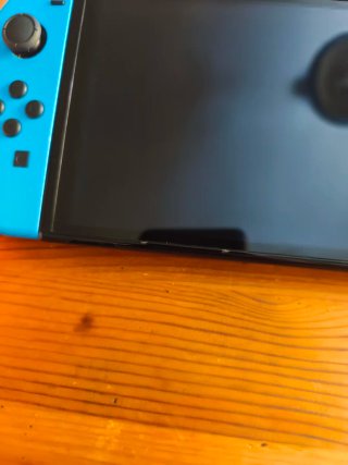 Nintendo Switch OLED + Joy-Cons + Cargador