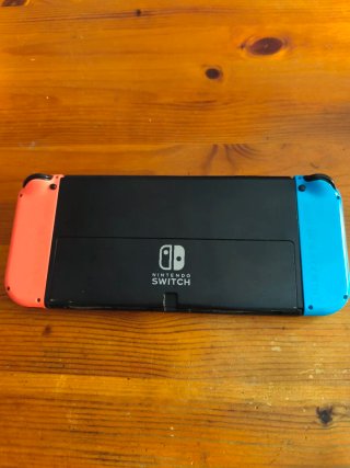 Nintendo Switch OLED + Joy-Cons + Cargador