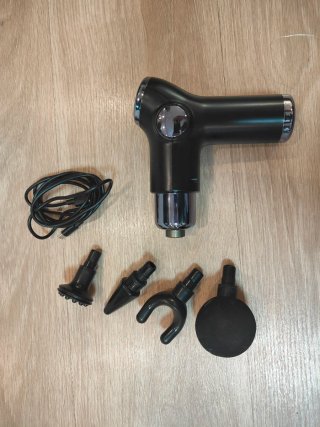 Pistola de masaje Handy
