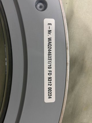 Lavadora Bosch gris puerta