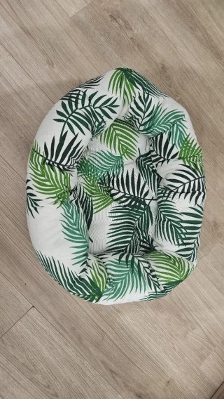 Cama para gato con estampado tropical