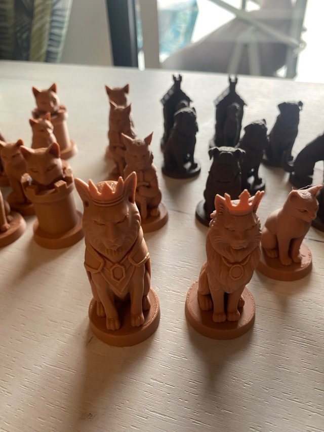 Ajedrez Gatos vs Perros