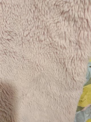 Chaleco rosa con estampado de zorros