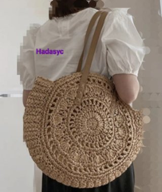 Bolso redondo de rafia natural