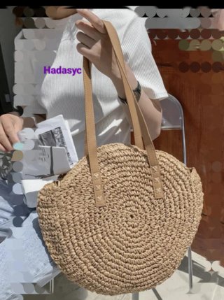 Bolso redondo de rafia natural