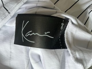 Camiseta Kani Rayas Blancas y Negras Chico