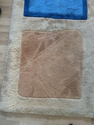 Alfombra de diseño beige y azul