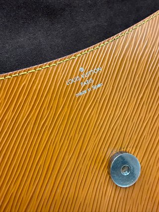 Bolso Louis Vuitton Buci Naranja
