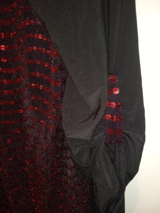Blusa con lentejuelas rojas y cremallera