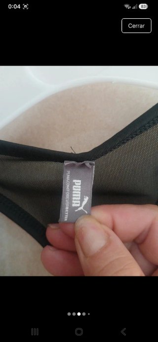 Top deportivo Puma adolescente negro