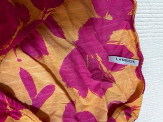 Conjunto Lanidor estampado naranja y fucsia