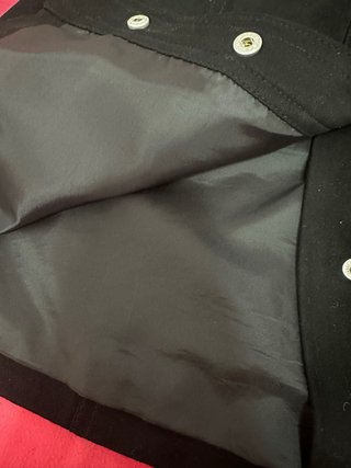 Falda negra botones delanteros