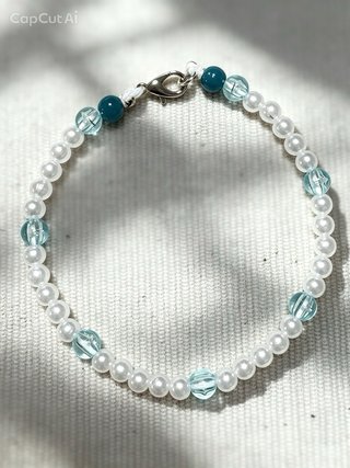 Pulsera perlas blancas y rosas con charm estrella.
