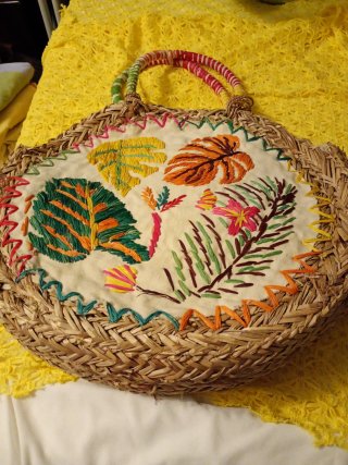 Bolso redondo tejido multicolor