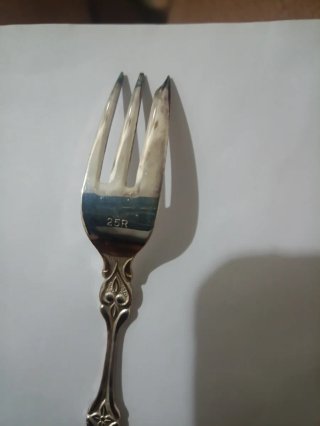 Tenedores de plata con medallón de porcelana