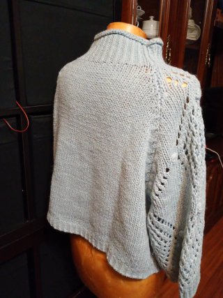 Jersey azul calado cuello alto