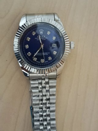 Reloj Rolex Azul y Plateado