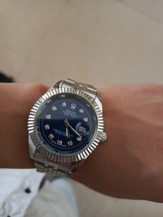 Reloj Rolex Azul y Plateado