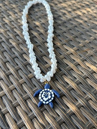 Collar de tortuga azul y blanco