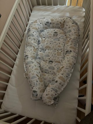 Nido reductor para cuna con estampado