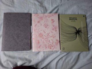 Lote 3 Cuadernos (gris, floral, sketch)