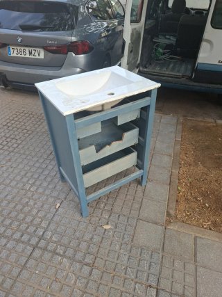 Mueble de lavabo azul con cajones