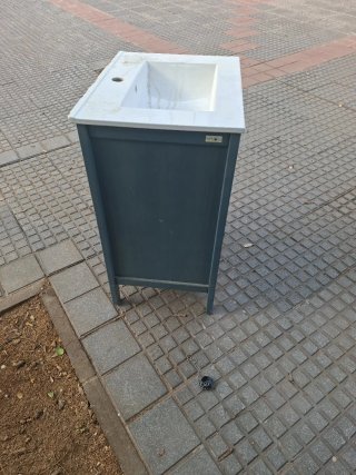Mueble de lavabo azul con cajones