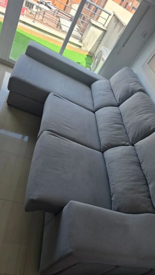 Sofá modular gris de tela