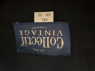 Vestido vintage corte lápiz negro. Tela elastica