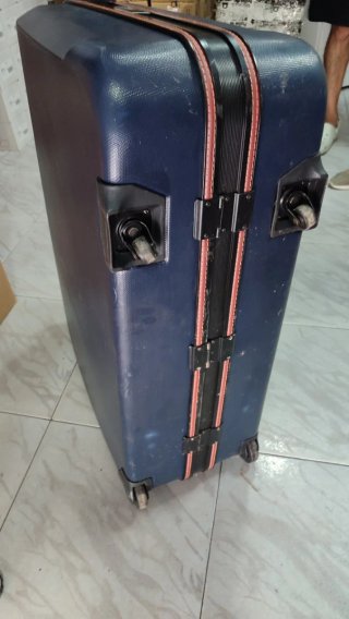 Maleta de viaje azul y marrón XXL