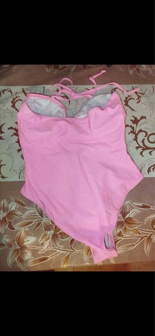 Bañador fucsia con estrellas. SIN USAR