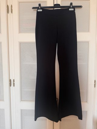 Pantalones negros acampanados talla S
