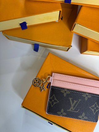 Cartera/billetera monogram LV Rosa y Marrón