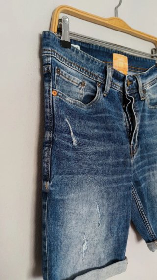 Shorts vaqueros desgastados para hombre