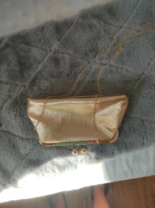 Bolso de mano elegante dorado