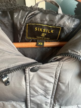 Chaqueta plumífero SikSilk gris