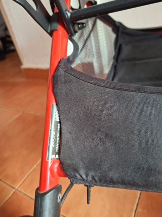 Cochecito de bebé naranja y gris