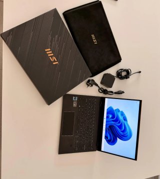 MSI Portátil Negro y Dorado